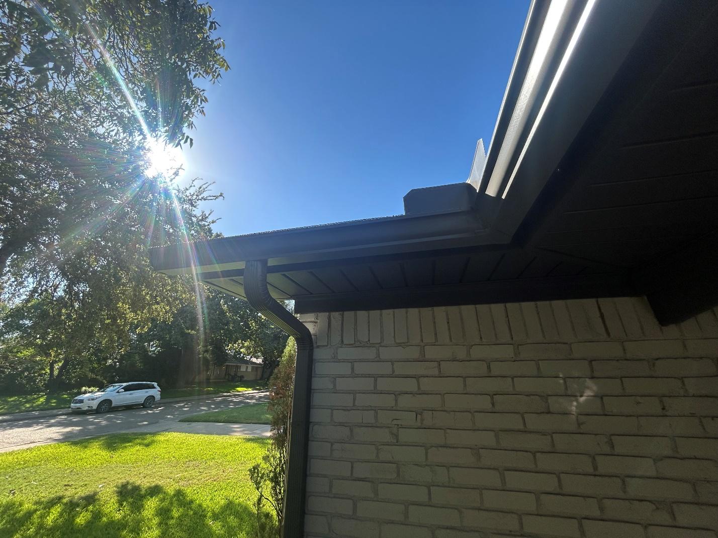 Roof fascia and soffit with sunlight showing proper ventilation on a Texas home
